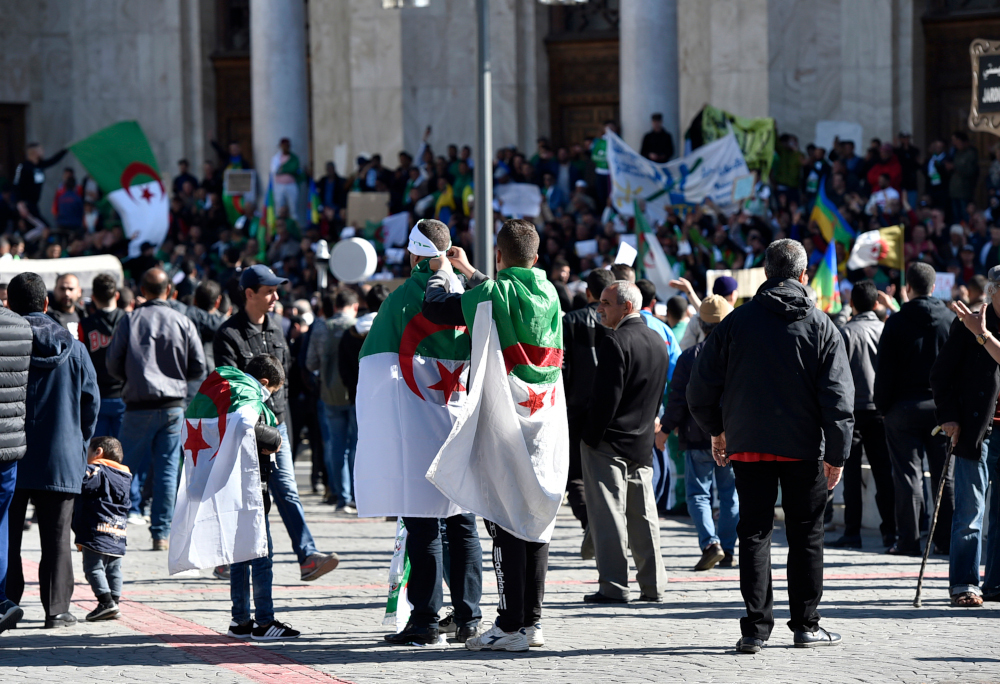 Algerians prepare for the first Friday rallies since the presidentu00e2u20acu2122s surprise announcement this week that he would not seek re-election but was cancelling April polls, in central Algiers on March 15, 2019. u00e2u20acu201d AFP pic 